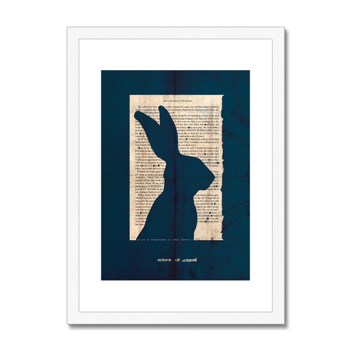 A white wooden framed fine art print showing a page from Alice in Wonderland with the silhouette of a Hare cut out on a navy blue background with the line "curiouser and curiouser" also cut out